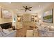 Inviting living room features custom built-ins, fireplace, and comfortable seating at 12028 Royal Lytham Ct, Charlotte, NC 28277