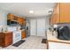 Traditional kitchen with tile floors, stainless steel refrigerator, and wooden cabinets at 1263 Crawford Rd, Rock Hill, SC 29730