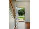 A welcoming entryway with hardwood floors showcasing a view of the outdoors at 12803 Matisse Ln, Charlotte, NC 28215