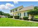 Attractive home with a spacious lawn and complemented by lush green surroundings at 12803 Matisse Ln, Charlotte, NC 28215