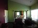 Open living space with view of kitchen at 12803 Matisse Ln, Charlotte, NC 28215