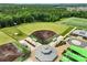 Aerial shot highlighting a baseball field and facilities; part of a community sports complex with lush landscaping at 1287 Fishing Creek Rd, Lake Wylie, SC 29710