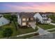 A charming two-story home featuring well-manicured landscaping, a two-car garage, and a welcoming facade at 1287 Fishing Creek Rd, Lake Wylie, SC 29710