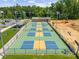 A top-down view of multiple pickleball courts, showcasing the community's recreational amenities and well-maintained grounds at 1287 Fishing Creek Rd, Lake Wylie, SC 29710