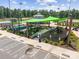 Community playground featuring modern equipment, shaded area, and secure fencing for safe and enjoyable play at 1287 Fishing Creek Rd, Lake Wylie, SC 29710