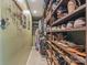 Walk-in closet with custom shelves and plenty of storage space for shoes and accessories at 13312 Edgetree Dr, Pineville, NC 28134