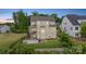 Spacious backyard with a stone patio, fire pit, and fenced yard, perfect for entertaining at 14218 Morningate St, Huntersville, NC 28078
