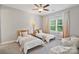 Bright bedroom with two twin beds, ample natural light, and a calming atmosphere perfect for relaxing at 14218 Morningate St, Huntersville, NC 28078