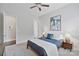 Serene bedroom featuring neutral walls, soft carpet, and ample natural light at 14218 Morningate St, Huntersville, NC 28078