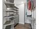 Organized closet with shelving and drawers, providing efficient storage and organization for clothing and accessories at 14218 Morningate St, Huntersville, NC 28078