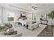 Bright main bedroom with large windows, tray ceiling, neutral tones, and tasteful décor, creating a serene retreat at 14218 Morningate St, Huntersville, NC 28078