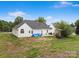 Spacious backyard with open patio area offering a great space for outdoor entertaining at 1579 Matthews Dr, Rock Hill, SC 29732