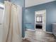 Bathroom with shower and view to bedroom at 1579 Matthews Dr, Rock Hill, SC 29732