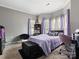 Cozy bedroom with natural light and a comfortable bed at 1579 Matthews Dr, Rock Hill, SC 29732