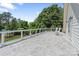 Large deck with chairs and green trees at 17112 Green Dolphin Ln, Cornelius, NC 28031