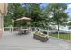 Relaxing deck with outdoor seating, lake view, and a serene waterfront setting at 17112 Green Dolphin Ln, Cornelius, NC 28031