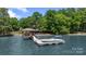 Lakeside dock and boat with gazebo at 17112 Green Dolphin Ln, Cornelius, NC 28031