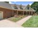 Charming home exterior with a manicured lawn at 17112 Green Dolphin Ln, Cornelius, NC 28031