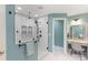 Bright bathroom featuring a glass enclosed shower and vanity with excellent lighting at 17112 Green Dolphin Ln, Cornelius, NC 28031