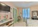 Bedroom featuring a TV, shelving, curtains and bed at 174 Stewart Acres Dr, Statesville, NC 28677