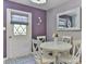 Cozy dining area with a round table, four chairs, and natural light, ideal for casual meals at 174 Stewart Acres Dr, Statesville, NC 28677