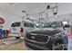 Spacious garage with two cars and overhead storage at 174 Stewart Acres Dr, Statesville, NC 28677