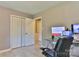 Bright home office features a closet, natural light and contemporary decor at 174 Stewart Acres Dr, Statesville, NC 28677