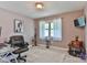 Bright home office features natural light from the window, and contemporary décor at 174 Stewart Acres Dr, Statesville, NC 28677