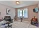 Bright home office features natural light from the window, and contemporary décor at 174 Stewart Acres Dr, Statesville, NC 28677