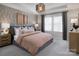 This cozy main bedroom has stylish decor, tray ceiling, lots of light, and soft carpet at 2425 Hedgecliff Rd, Kannapolis, NC 28025