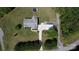 Aerial view of the home with a large yard, long driveway, and a detached two-car garage at 260 Treebark Rd, Statesville, NC 28625