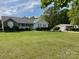 Charming single-story home featuring a well-manicured lawn, attached garage, and welcoming front porch at 260 Treebark Rd, Statesville, NC 28625