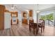 Well-lit kitchen includes stainless steel appliances, wooden cabinets, and an adjacent dining area at 260 Treebark Rd, Statesville, NC 28625