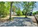 Spacious gravel backyard with ample space for parking or recreation at 309 N Congress N St, York, SC 29745