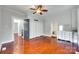 Bedroom featuring hardwood floors, a closet and direct access to an ensuite bathroom at 309 N Congress N St, York, SC 29745