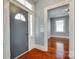 Welcoming entryway with hardwood floors and charming architectural details at 309 N Congress N St, York, SC 29745