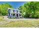 Charming two-story home with front porch and mature trees in a tranquil neighborhood at 309 N Congress N St, York, SC 29745