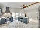 Open kitchen features an island, modern appliances, vaulted ceilings and natural light at 309 N Congress N St, York, SC 29745
