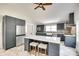 Modern kitchen featuring an island, stainless steel appliances, and grey cabinets at 309 N Congress N St, York, SC 29745
