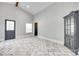 Bright living room featuring brick floors, neutral walls, and modern fixtures at 309 N Congress N St, York, SC 29745