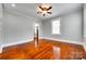 Bright living room boasts hardwood floors and neutral paint at 309 N Congress N St, York, SC 29745