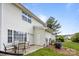 Private patio with seating, white siding, perfect for enjoying the outdoors at 3736 Melrose Cottage Dr, Matthews, NC 28105