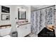 Bathroom featuring a vanity with granite countertops, a framed mirror, and a shower at 3810 Springway Dr, Gastonia, NC 28056