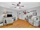 Living room featuring a desk, comfortable chairs, hardwood floors, and plenty of natural light at 3810 Springway Dr, Gastonia, NC 28056