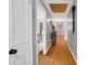 Hallway features hardwood floors, gray walls, and is open and airy, with great flow at 3810 Springway Dr, Gastonia, NC 28056