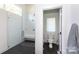 Beautiful bathroom featuring a glass shower and toilet with hardwood floors at 4211 Mantle Ct, Charlotte, NC 28205