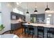 Elegant kitchen with stainless steel appliances, a spacious island, and ample counter space at 4211 Mantle Ct, Charlotte, NC 28205