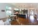 Modern kitchen featuring gray cabinetry, a large island, and sleek pendant lighting at 4211 Mantle Ct, Charlotte, NC 28205