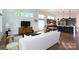 Open-concept living area with stylish furnishings and easy access to the kitchen at 4211 Mantle Ct, Charlotte, NC 28205