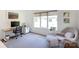 Bright office featuring large windows, modern desk, and comfortable seating area at 4211 Mantle Ct, Charlotte, NC 28205